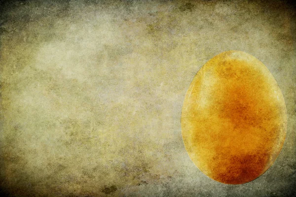 Яйце на гранжевому фоні — стокове фото