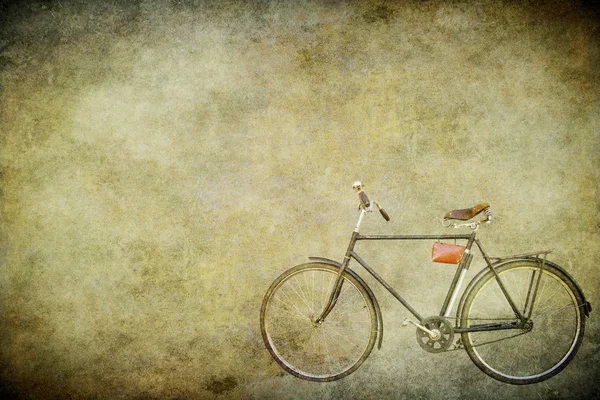 Grunge arka plan üzerinde bisiklet — Stok fotoğraf