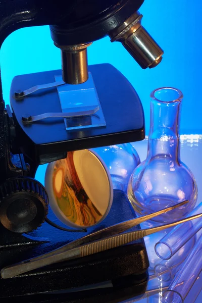 Microscope and test-tubes — Stock Photo, Image