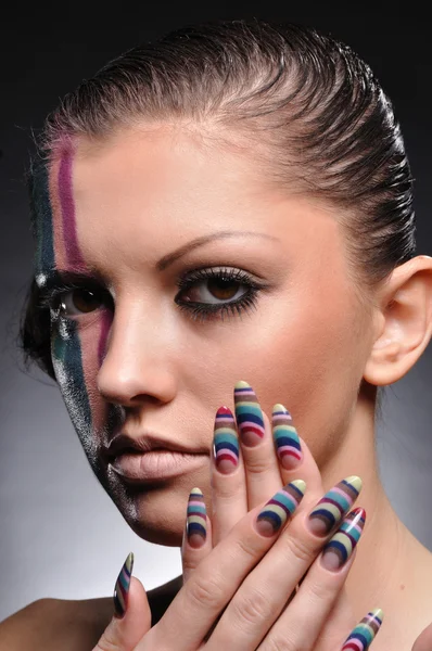 Portrait of beautiful girl with artistic make-up — Stock Photo, Image