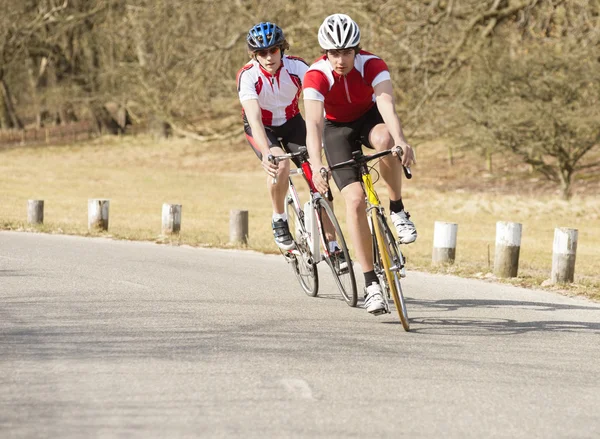 Cyclists Riding On A Country Road — Stock Photo, Image