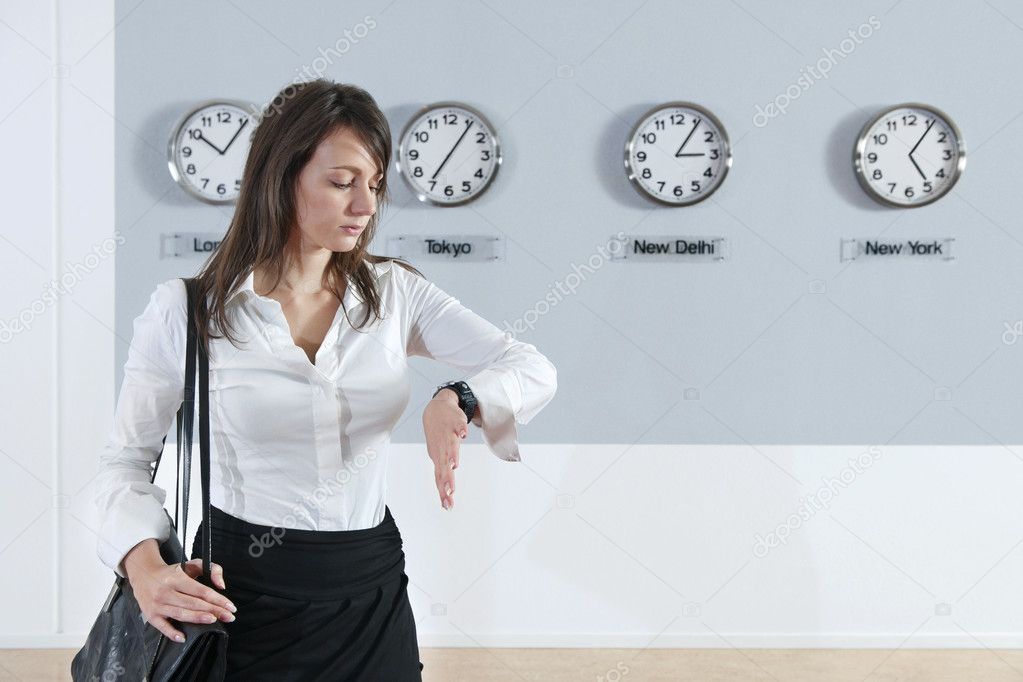 Businesswoman Checking Time