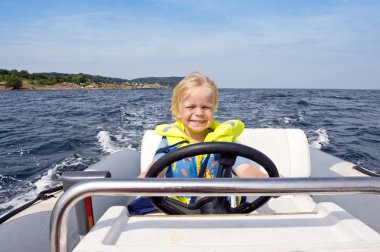 Young helmsman clipart