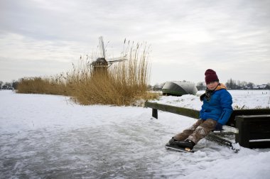 Resting on a jetty clipart