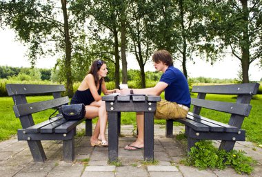 Couple at picnic table clipart