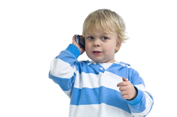 Мальчик звонит с мобильного телефона — стоковое фото