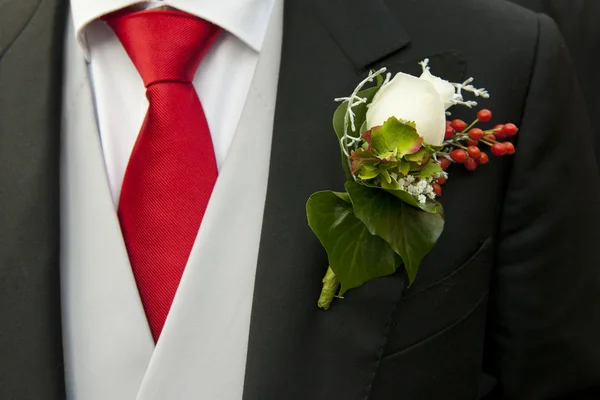 Groom and corsage — Stock Photo, Image