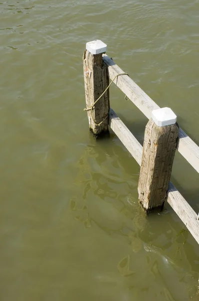 stock image Old pile mooring