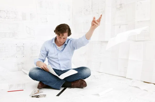 Engineer checking drawings — Stock Photo, Image