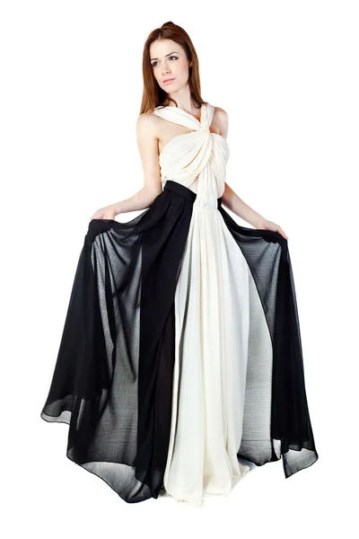 Krásná žena na sobě elegantní šaty, bílé pozadí vystupují v studio.fashion Foto. — Stock fotografie