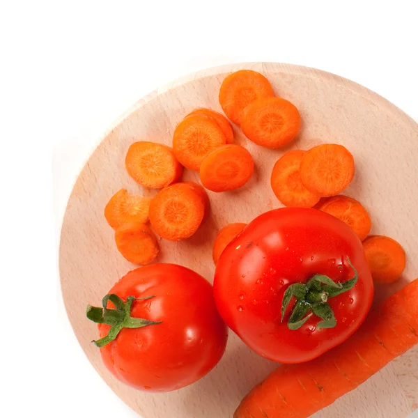 Carrots and tomato — Stock Photo, Image