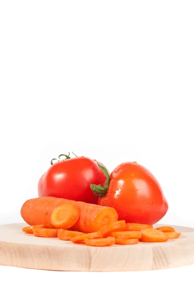 Cenouras e tomate — Fotografia de Stock