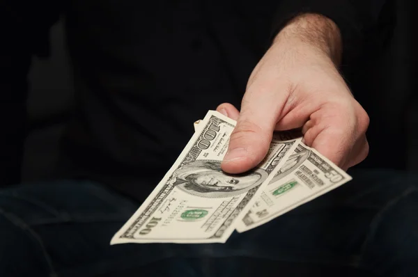 Paying in US dollars — Stock Photo, Image