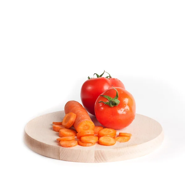 Cenouras e tomate — Fotografia de Stock