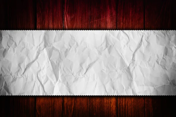 Paper over wooden background — Stock Photo, Image
