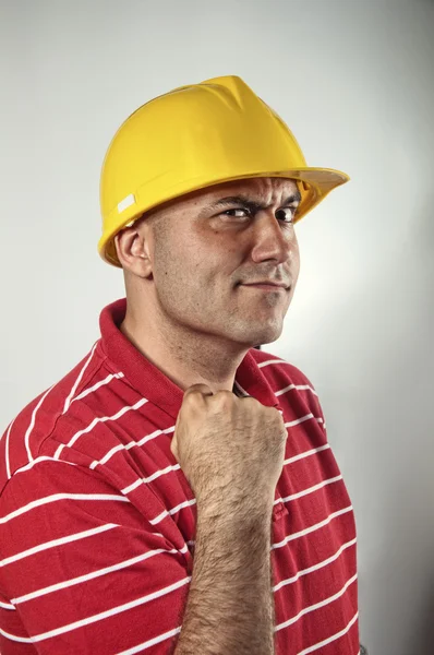 Kendine güvenen genç inşaat işçisi — Stok fotoğraf