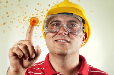 Construction engineer with touch screen clipart