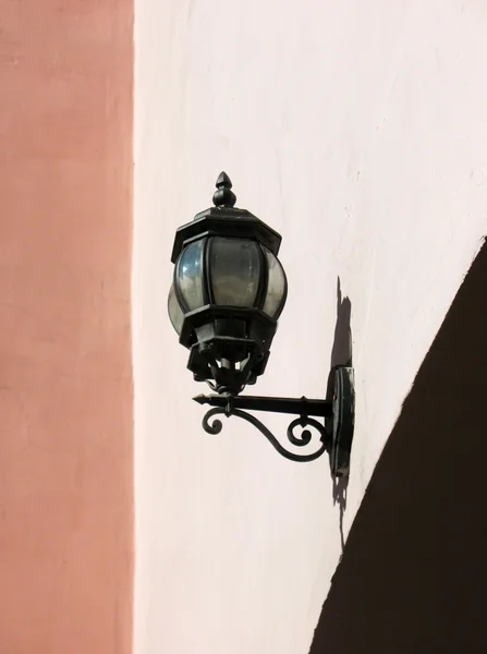 Street lamp on the wall. St. Petersburg