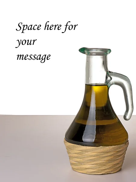 Olivolja i retro glas flaska, vit bakgrund — Stockfoto