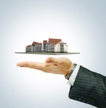 Hotel building in businessman's hand clipart