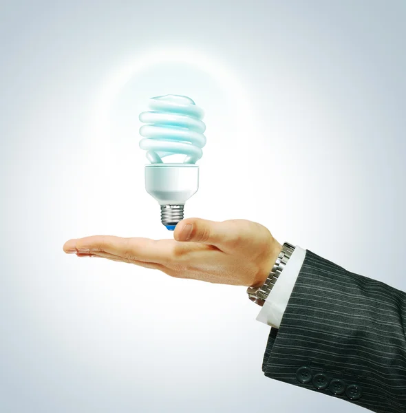 Saver Lightbulb на бізнесмен Хенд — стокове фото