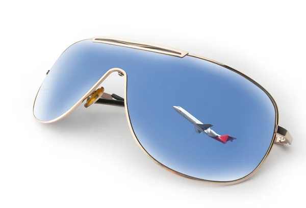 Flugzeug mit Sonnenbrille in den Himmel — Stockfoto