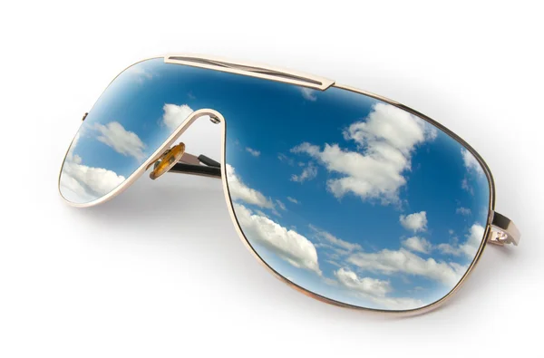 Blue sky in sunglasses — Stock Photo, Image