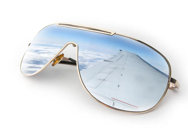 Plane wing in sunglasses — Stock Photo, Image