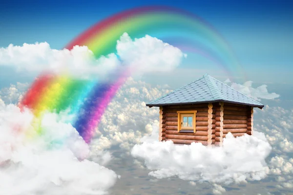 Small house on cloud in sky — Stock Photo, Image
