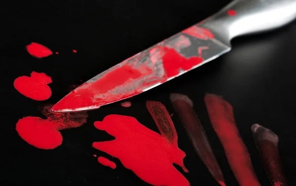 Knife in blood — Stock Photo, Image