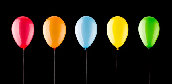 Пять разноцветных воздушных шаров — стоковое фото