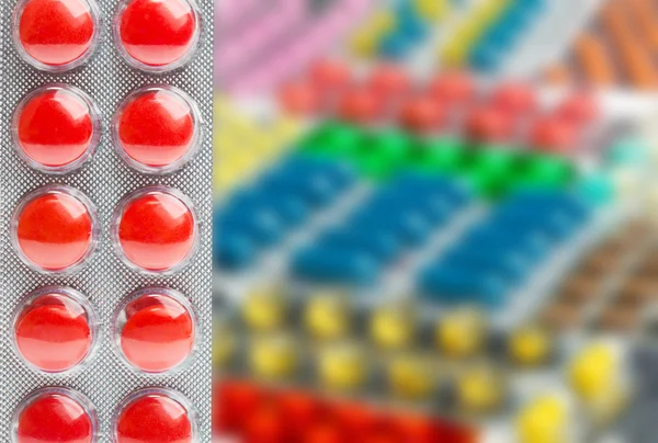 Piatto di pillole rosse — Foto Stock