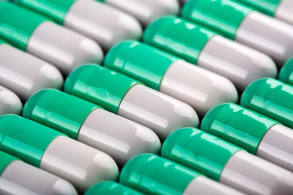 Pillen op een rij — Stockfoto