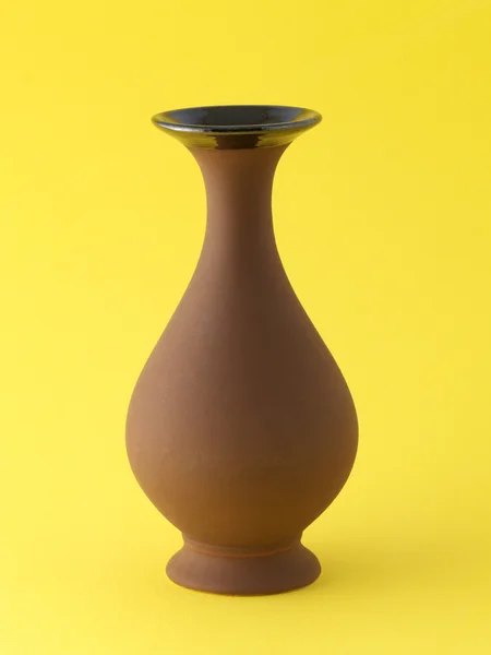 Brown vases on yellow — Stock Photo, Image