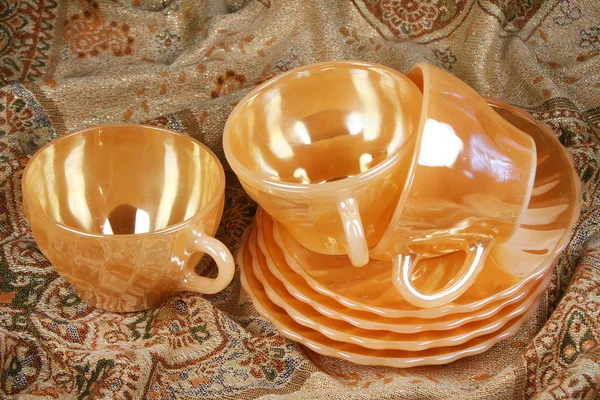 Golden tea cups — Stock Photo, Image