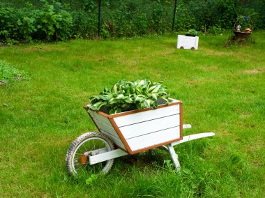 A wooden wheelbarrow clipart