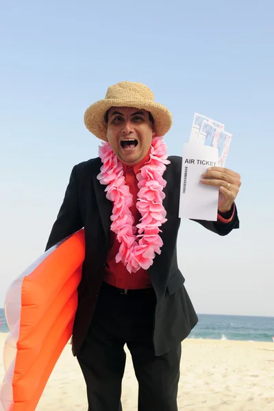 stock image Ready for a holiday: businessman on the beach