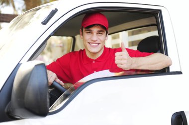 Postal delivery courier in a van showing thumb up hand sign clipart