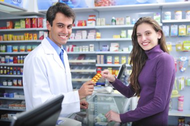 Pharmacist and client at pharmacy clipart