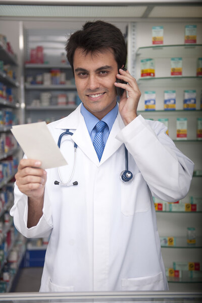 Portrait of a male pharmacist at pharmacy