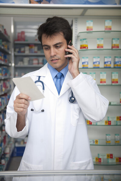 Portrait of a male pharmacist at pharmacy