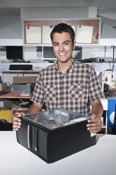 stock image Happy owner of a computer repair store