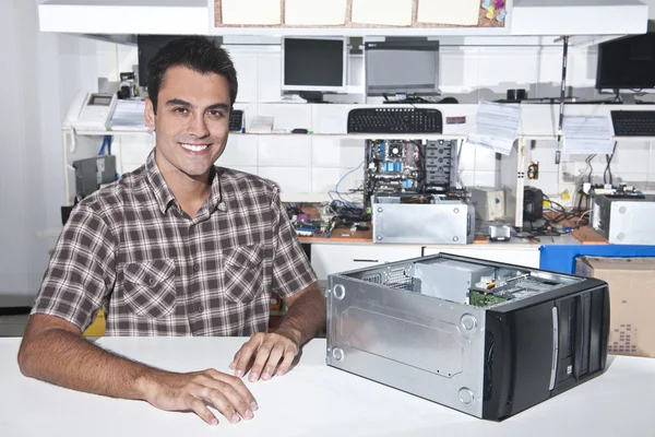 stock image Happy owner of a computer repair store