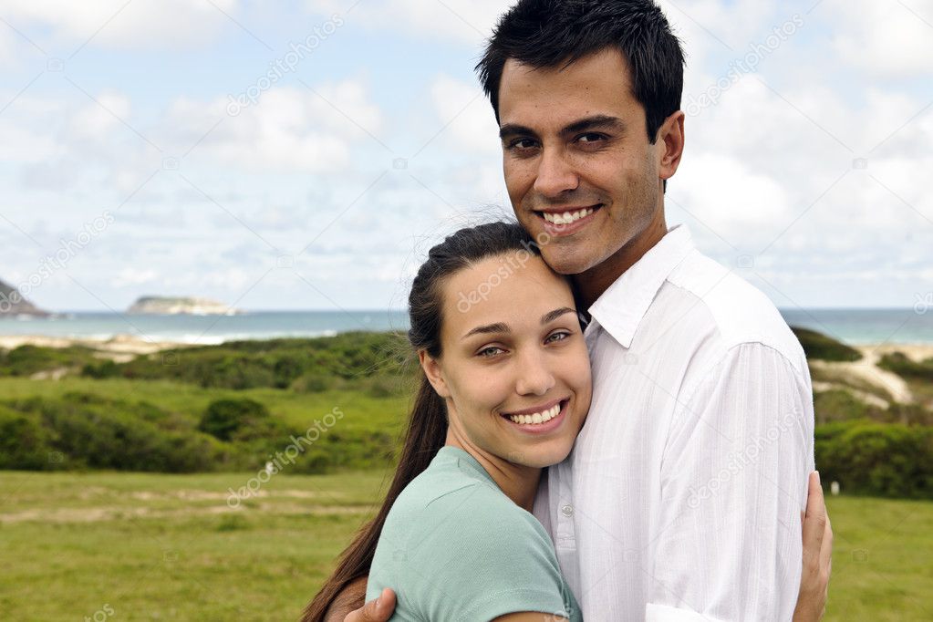 Happy hispanic couple smiling