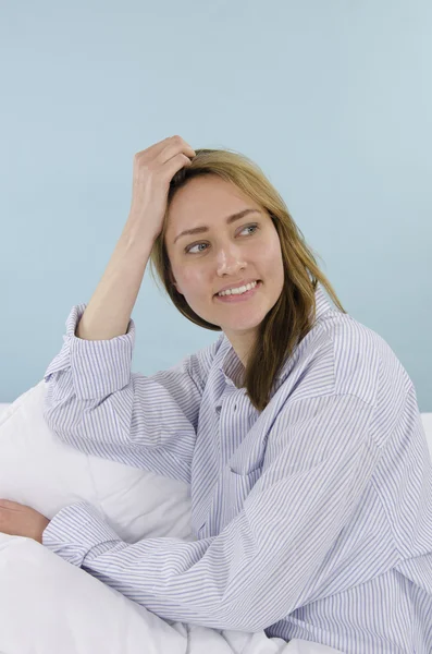 Portrait of a woman in bed — Stock Photo, Image
