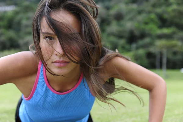 stock image Sportive woman doing push-ups