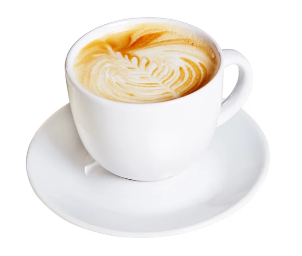 Koffiekopje met artistieke crème decoratie — Stockfoto