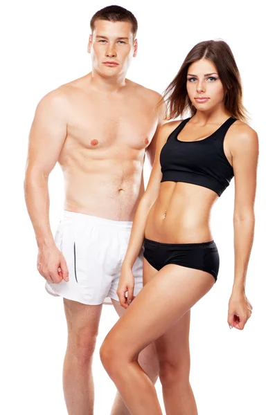 Bella coppia dall'aspetto sano in abito sportivo — Foto Stock