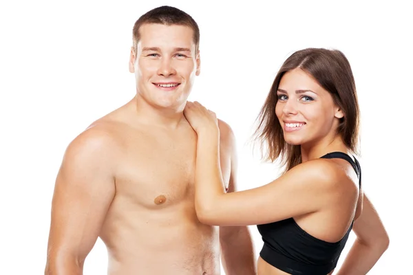 Beautiful healthy-looking couple in sports outfit — Stock Photo, Image