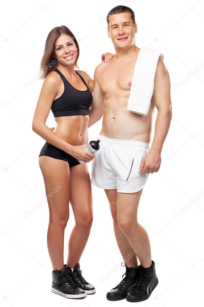 Beautiful healthy-looking couple in sports outfit